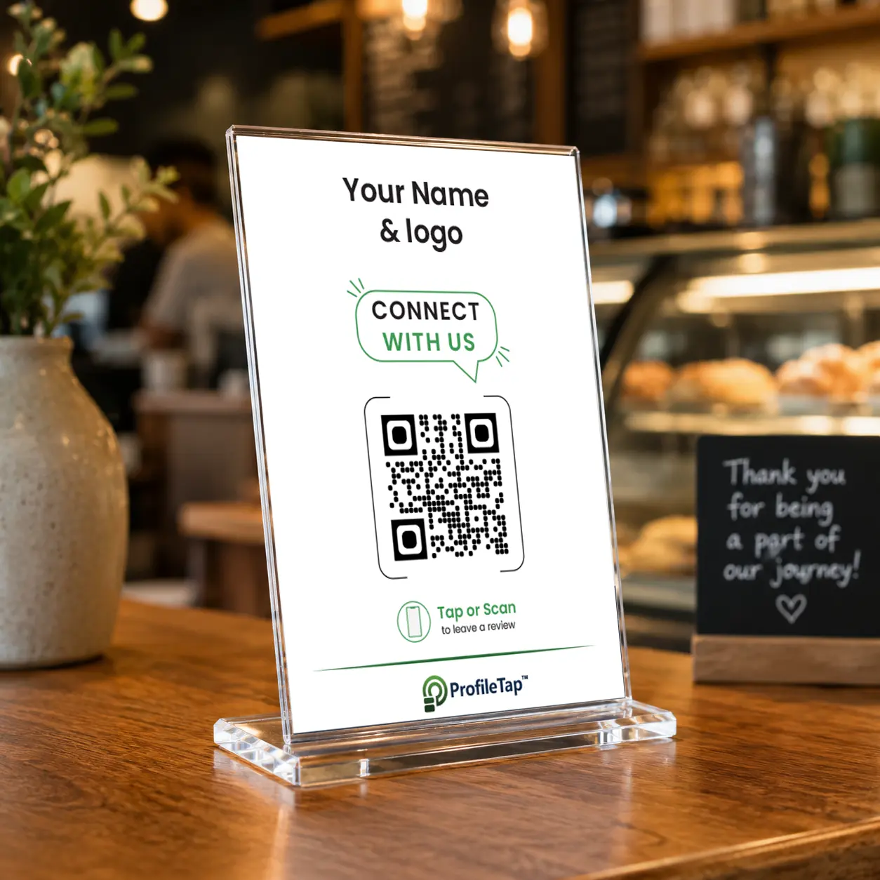 ProfileTap Google review standee with NFC and QR on a business billing counter.